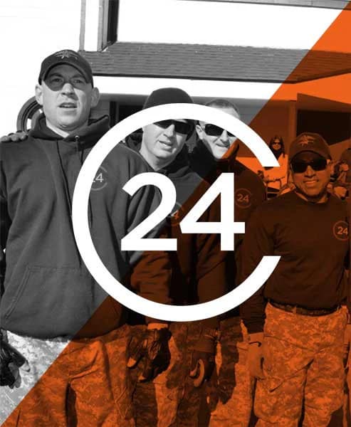 Veterans wearing Catch24 gear together at an event